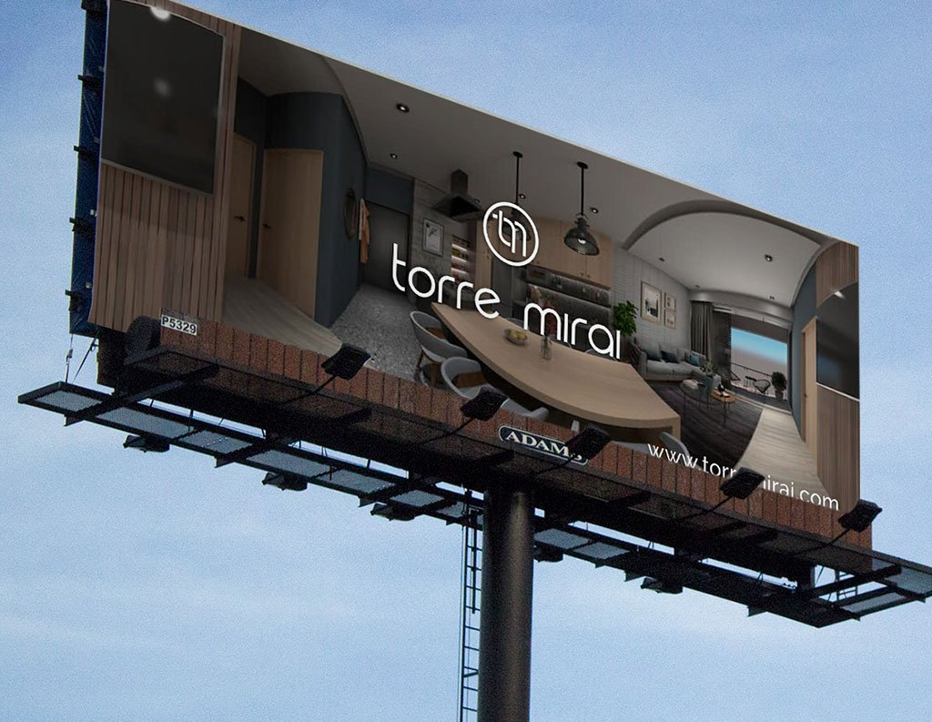 Aplicación de logotipo de Torre Mira sobre un espectaular